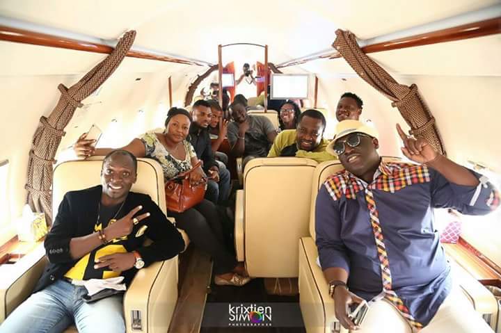 Sammie Okposo and team onboard a private jet, off to an event. 1