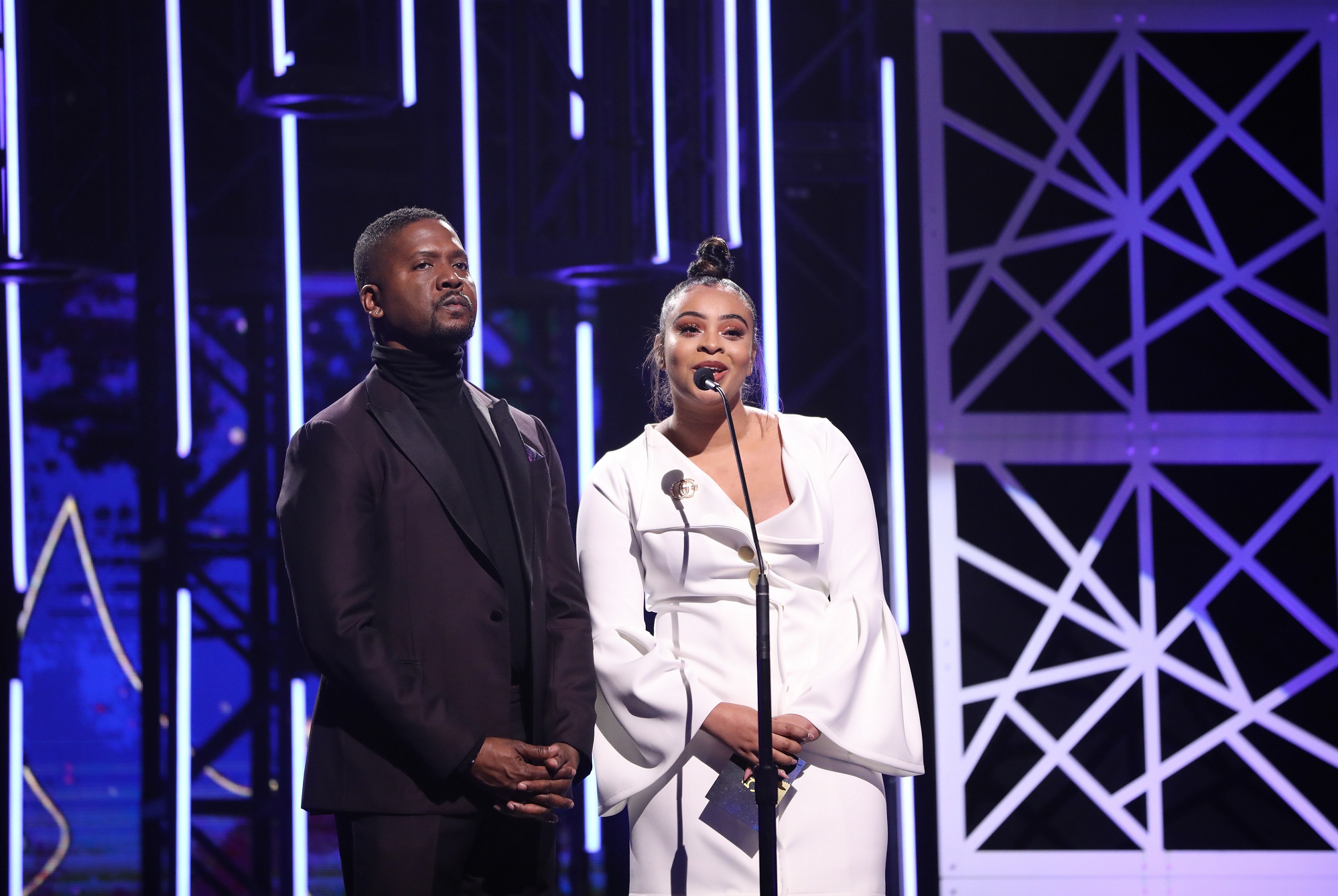 Donald Lawrence and Koryn Hawthorne present at the Dove Awards